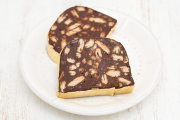 dessert chocolate salami on white dish