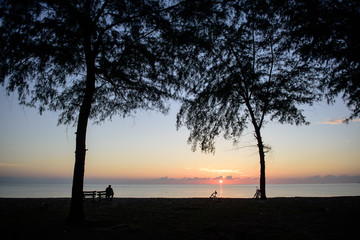 The silhouette of man  on the beach.
