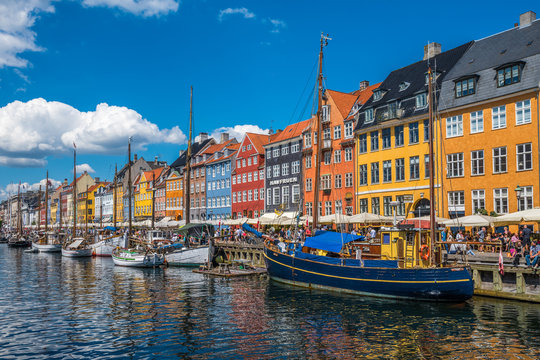 Nyhavn district is one of the most famous landmarks in Copenhagen, Denmark