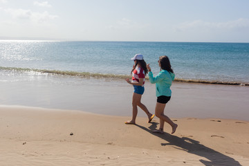 Girls Walking Beach Shoreline Ocean