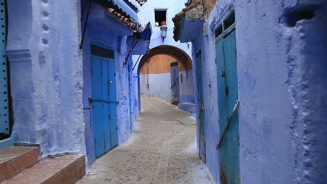 POV, walking in blue town Chefchaouen Chaouen / Morocco, first point of view
