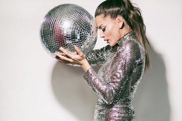 Woman with disco ball 