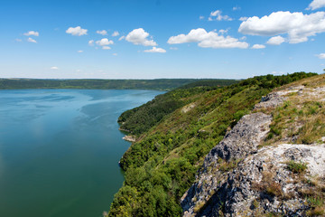 River canyon with green hills