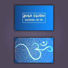 Business card for yoga studio or yoga instructor. Ethnic background with mandala ornament and ohm
