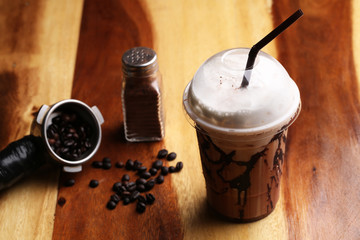 ice coffee on wood floor , Mocha