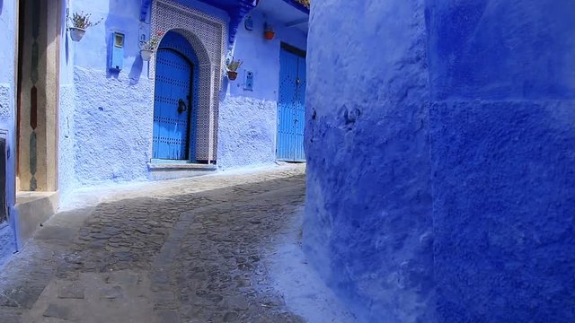 POV, walking in blue town Chefchaouen Chaouen / Morocco, first point of view