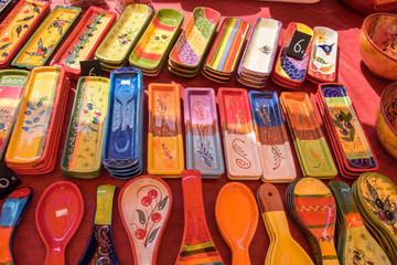 Provence traditional colored spoon rests sold at local street market