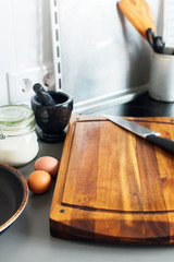 Chopping Board and Knife on Grey Table-top Kitchen
