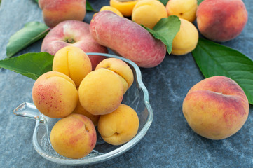 Fototapeta na wymiar Apricot, Raspberry, Peach and Nectarine with Leaves