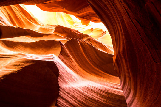 slot canyon in beautiful hues of yellow, orange and red in northern Arizona