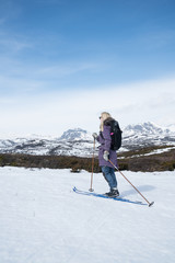 Fototapeta na wymiar Girl Skiing