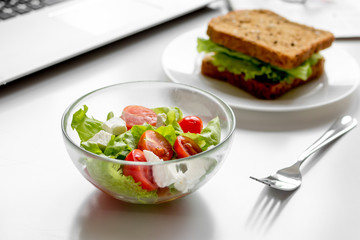 concept of lunch in office at work desktop