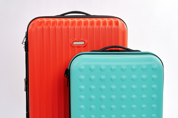 Cropped image of modern suitcases. Business travel bags close up.
