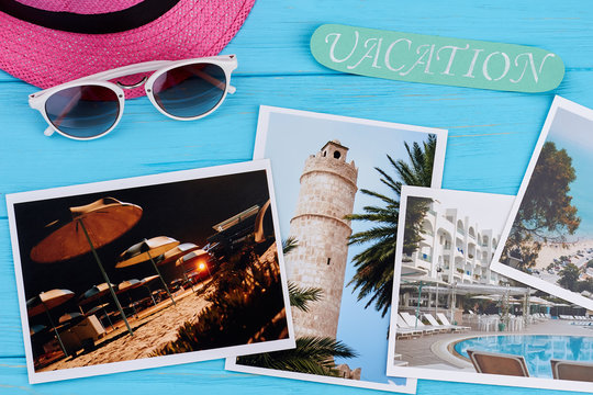 Summer vacation concept, vintage board. hat, glasses, message, photos.