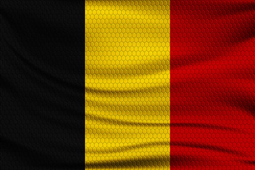 Fototapeta premium National flag of Belgium on wavy fabric with a volumetric pattern of hexagons. Vector illustration.