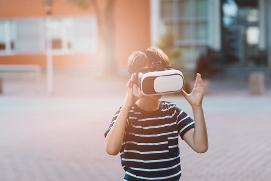 Boy Watching Simulation In Virtual Reality Googles