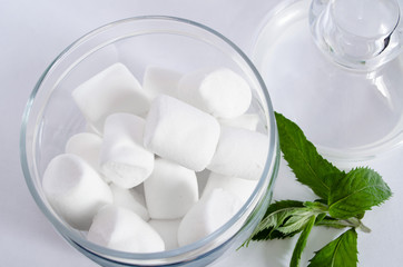 Pattern sweet marshmallow, candy on white background, view white marshmallow, with Mint leaves