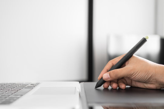 Man using graphic tablet
