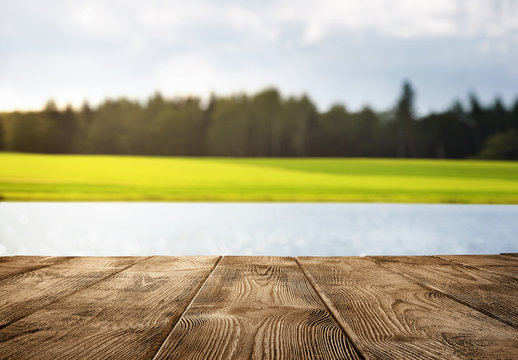 Close Up Of Old Empty Wooden Pier Over The Lake With Copy Space