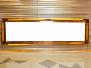 Blank mock up of  gold advertisement frame in  shopping center .