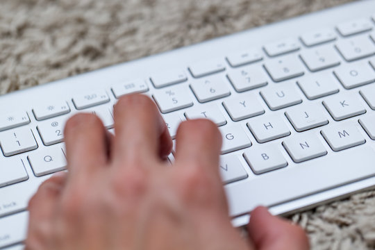 Close up of typing on keyboard