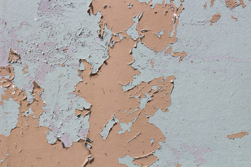 Rusty iron wall covered with paint