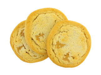 Three chunky peanut butter cookies isolated on a white background.