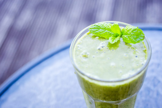 Freshly Blended Green Fruit Mint Smoothie in the Glass, Selective Focus, Horizontal Wallpaper