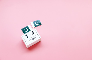 AUGUST 14 Wooden calendar Concept independence day of Pakistan and Pakistan national day.Copy space,minimal style
