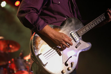 Obraz premium Guitars, Bass and Banjos - instruments at work 