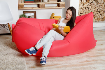 Obraz premium Woman in inflatable hammock