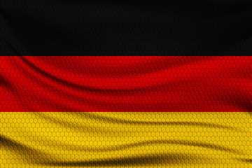 National flag of Germany on wavy fabric with a volumetric pattern of hexagons. Vector illustration.