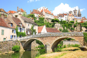 Fototapeta na wymiar Historic bridge over the river Armancon in Semur-en-Auxois, Burgundy, France