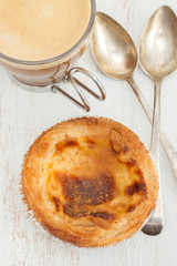 portuguese dessert pastel de nata with cup of coffee