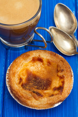 portuguese dessert pastel de nata with cup of coffee