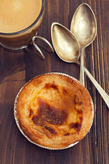 portuguese dessert pastel de nata with cup of coffee