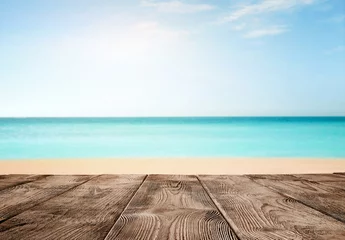  Summer background, close up of old empty wooden pier over the turquoise ocean with copy space © rangizzz