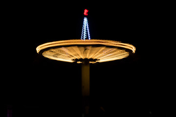 Blurred carousel at night