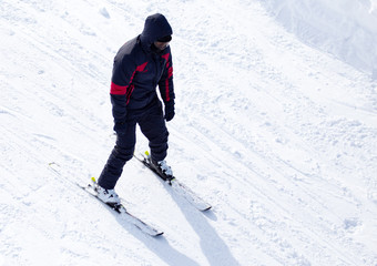 Fototapeta na wymiar Skier skiing in winter