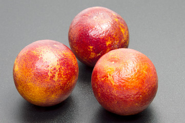 Half of bloody orange with leaf isolated  background