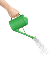 Hand watering from a watering can