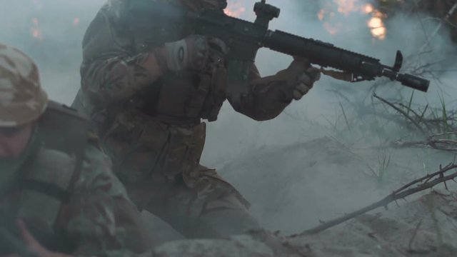 Two men attacked while sitting in ambush and leaving in smoke.