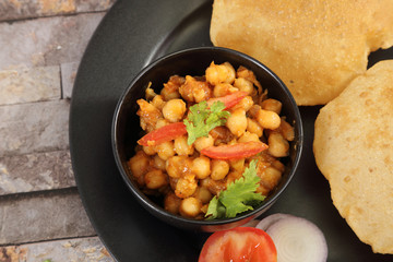 Chole with puri or Chana Masala with Puri Indian Food