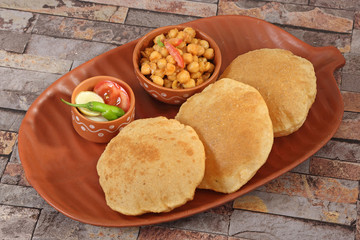 Chole with puri or Chana Masala with Puri Indian Food