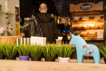 Decorative figurine and flowers in restaurant
