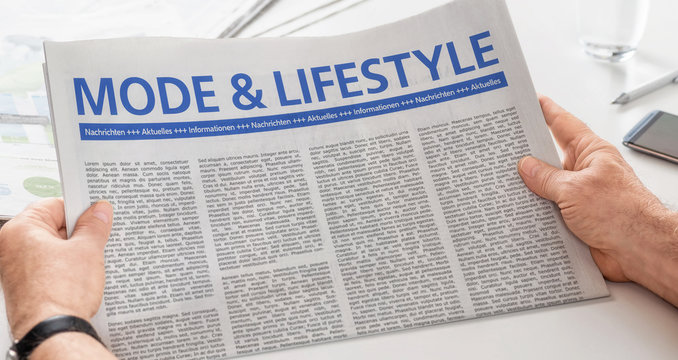 Mann liest Zeitung - Mode und Lifestyle