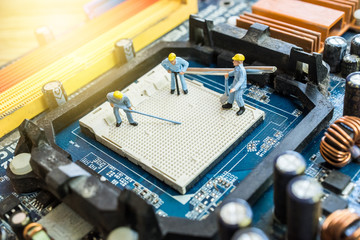 Miniature worker repairing circuit mother board