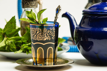 Traditional Arab mint tea, white background