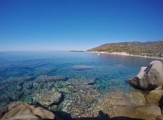 Fototapeta na wymiar Cavoli bay and Punta Fetovaia on the background, Elba island, italy 