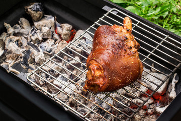 Delicious pork knuckle roasted on the grill